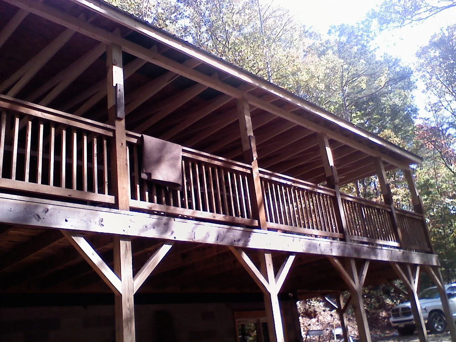 Timber framing under a new elevated porch and deck — Roof Leak Repair in Northfork by Roofing Brothers